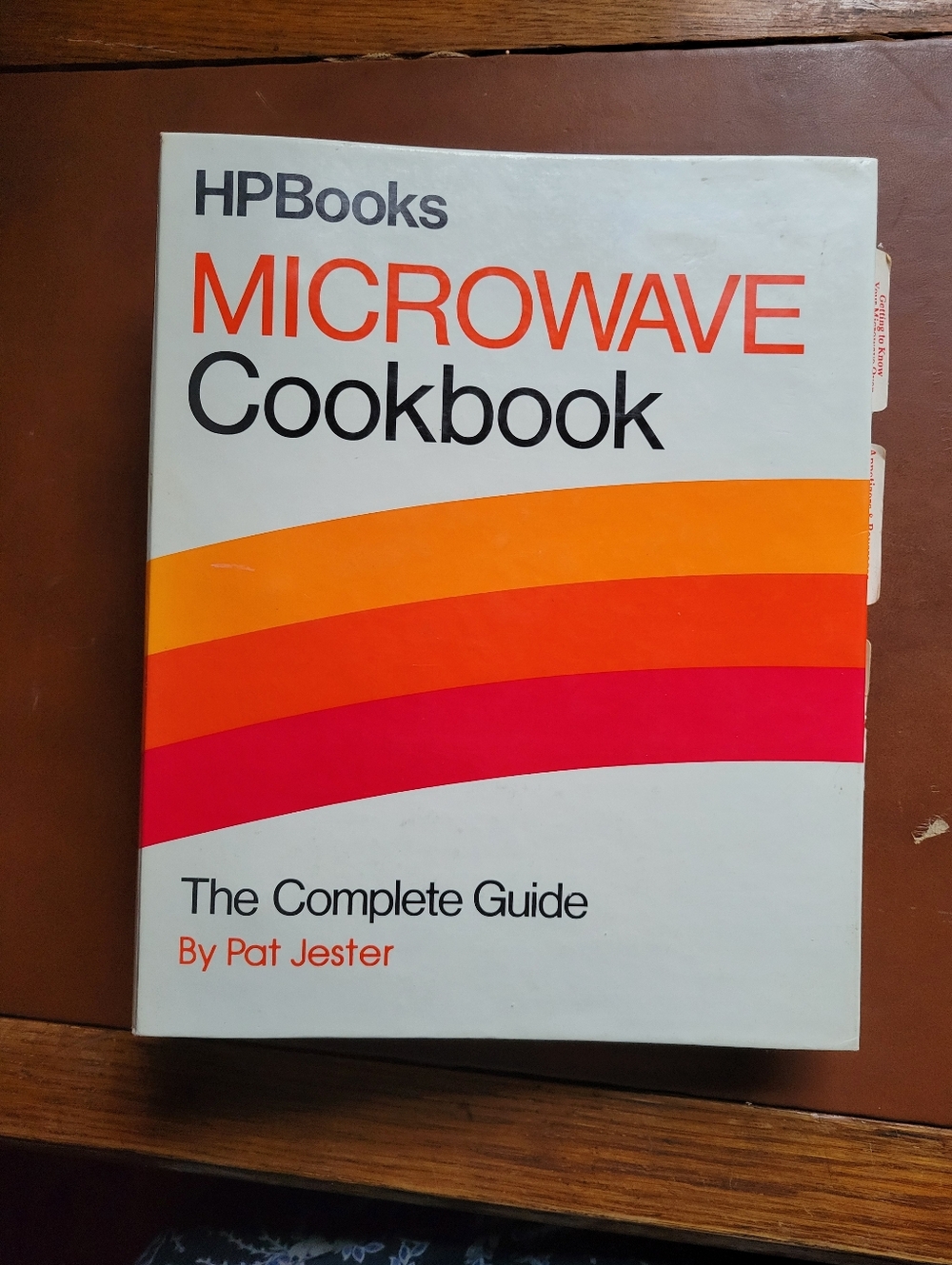 HPBooks Microwave Cookbook - White with Yellow, Orange, Red & Pink Stripes